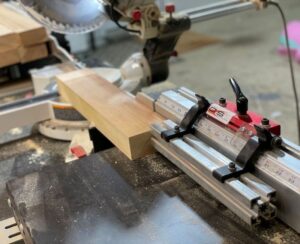 Flip foot slider in a workshop with a miter saw
