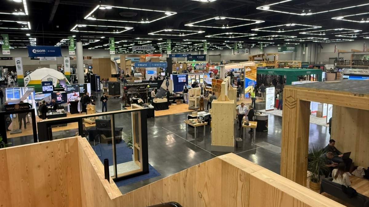 mass-timber-conference-expo-floor-overview.jpg Mass timber construction conference expo floor with timber structures and booths